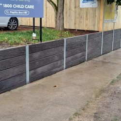 Fence on Retaining Wall-resized-2000x901-min