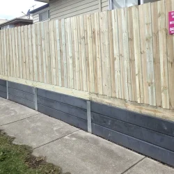 Paling fence on concrete retaining wall-resized-2000x1125-min